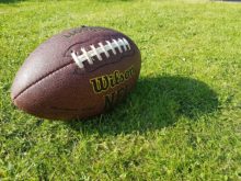 Wilson American football on grass